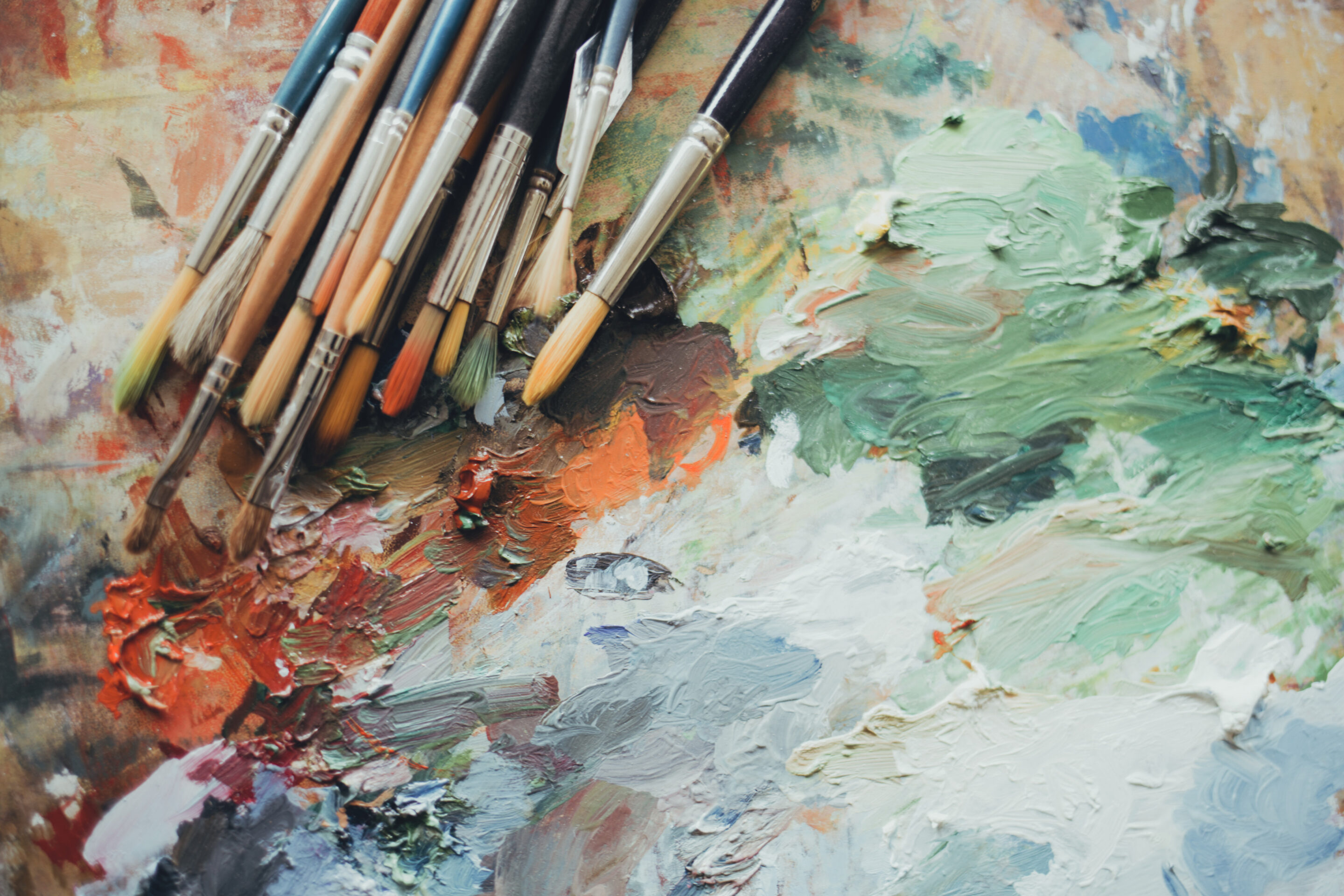 Colorful artist brushes and paint.